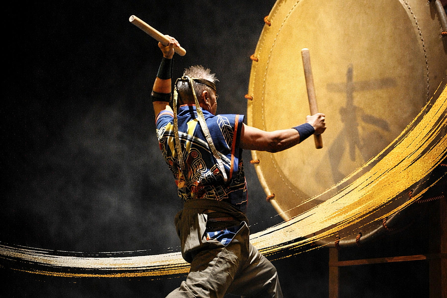 Kenny Endo playing taiko drum